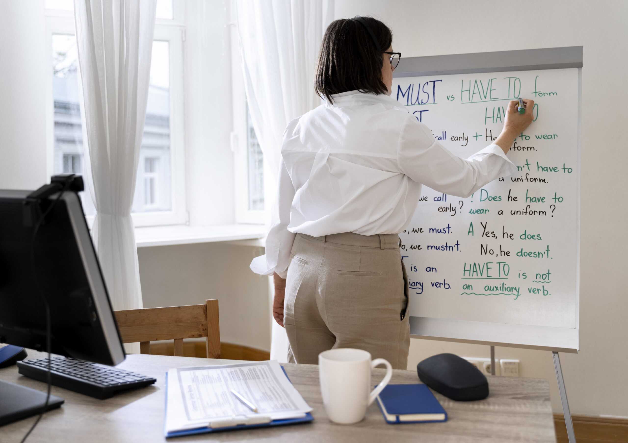 english-teacher-doing-her-class-with-whiteboard